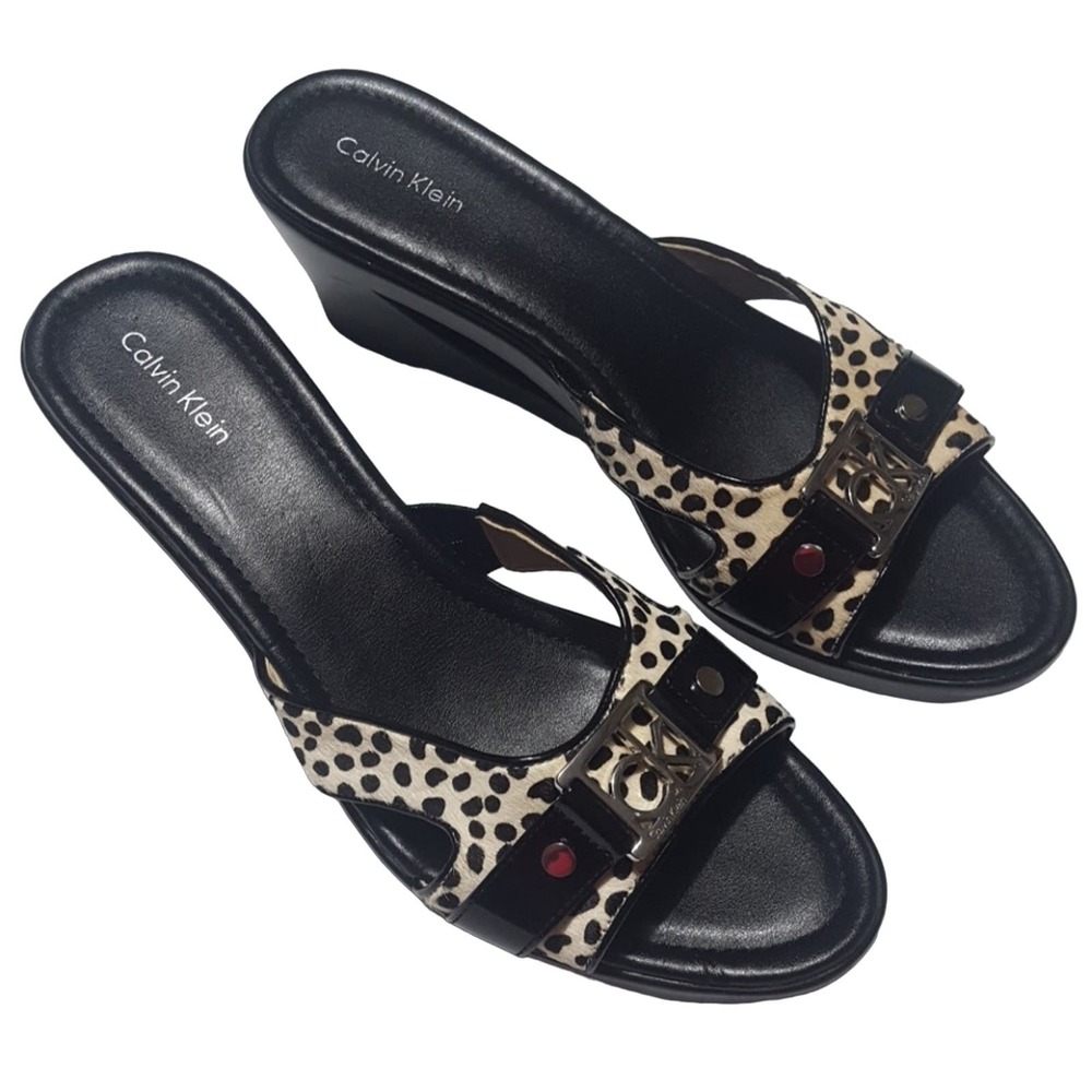 Calvin Klein "Rebah" black white spotted faux calf hair platform cutout wedges